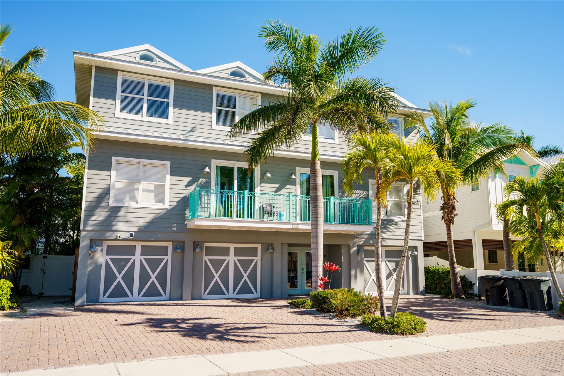 Florida coastal home with palm trees
